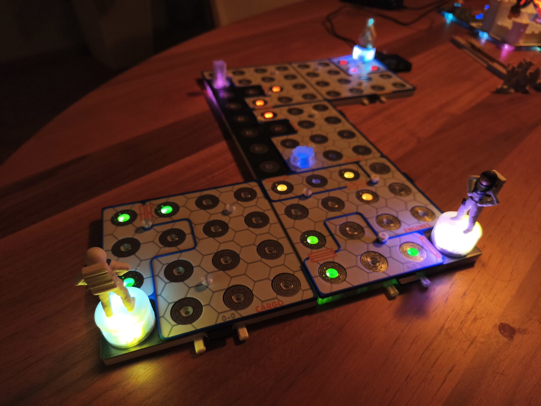 Two figures on glowing bases during play